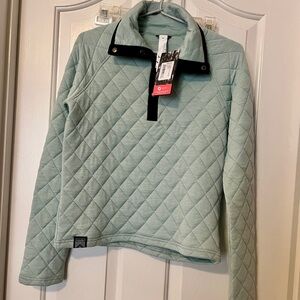 Oiselle Quilted snap Pullover in Soft aqua Green with black trim. XS